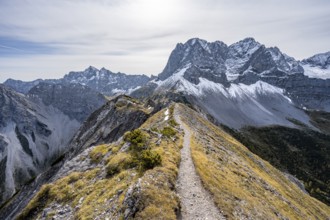Hiking trail on the ridge of the Hahnkampl, mountain panorama with steep rocky peaks, view of