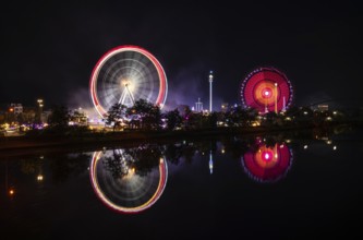 Night shot, overview, reflection in the river Neckar, Ferris wheel, Europa Rad, Gladiator, rides,