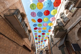 Jerusalem, Israel, Nahalat Shiva tourist promenade and colorful umbrella street of Old City, Asia