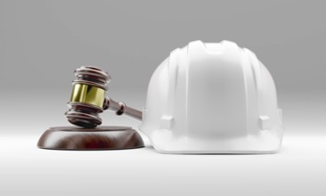 White hard hat and gavel on a gradated background