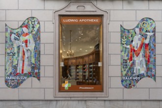 Modern mosaic pictures of Paracelsus and Galenos, on the facade of a pharmacy, Bad Kissingen, Lower
