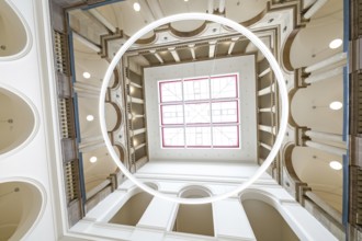 Modern interior design with a circular design, a high ceiling and lots of natural light, University