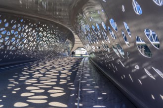Light effects from the sun in the Parkbruk, a cycle and pedestrian bridge in the city centre of