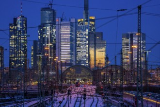 Railway tracks in front of the main railway station in Frankfurt am Main, skyline of skyscrapers in