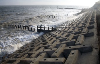 Wave swash hitting sea wall, Felixstowe, Suffolk, England, United Kingdom, Europe