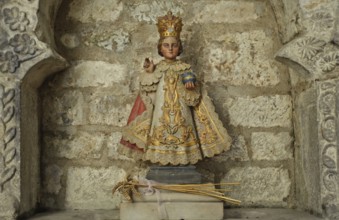 Copy of a statuette representing Jesus Christ as a child. It is called the Little Jesus of Prague.