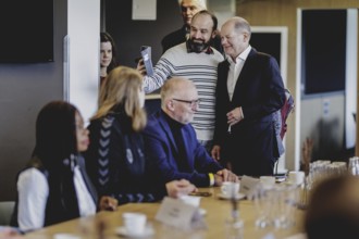 Olaf Scholz (SPD), Federal Chancellor, at a meeting with migrants and people involved in the field