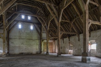 Interior showing wooden truss of 13th century Gothic monastic tithe barn of the Ter Doest Abbey at