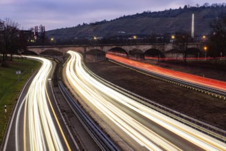 Multi-lane road at night with Plinsau bridge, arch bridge over the Neckar. Federal road B10 in