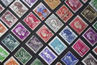 Old french postage stamps depicting Marianne, the personification of the French republic