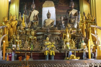 Numerous Buddhas and the city pillar, which is considered the home of the city's protective spirit,