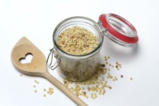 Fregola in glass container, pasta variety from Sardinia, Italy, Europe