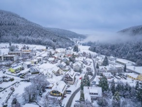 Dreamy village in a wintry and misty forest landscape, Enzklösterle, Calw district, Black Forest,