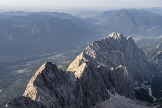 Steep rocky ridge, Waxensteinkamm, with summit Waxenstein, in the evening light, view from the