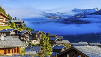 Roofs covered with hoarfrost, fog rising, Grimentz, Val d'Anniviers, Valais Alps, Canton Valais,