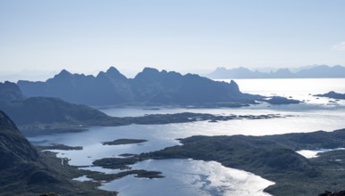 Mountain peak and fjord Austensfjorden, fjord landscape and sea, view from the summit of
