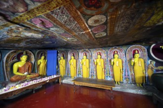 Buddha figures in the Aluvihara Rock Cave Temple or Cave Monastery, Aluvihara, Matale, Central