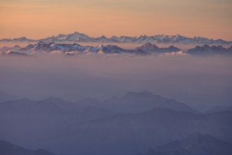 Morning haze and fog over mountain ranges, morning light, summer, Ammergebirge, Tyrolean Alps