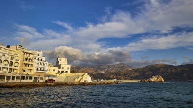 Morning light, A beautiful coastal town with harbour and mountains in the background, Pigadia, town