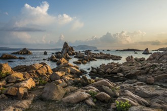 Lonely beach with granite rocks, sunrise, Spiaggia Poltu Manzu, Capo Ceraso, near Olbia, Sardinia,