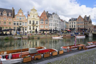 Tourist boats moored along the Graslei, Ghent, Flanders, Belgium, Europe