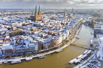Aerial view over the river Trave and church towers in the old town of the Hanseatic City of Lübeck