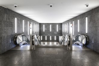 Tunnel subway illuminated with LED light with escalators to the Museumsinsel underground station,