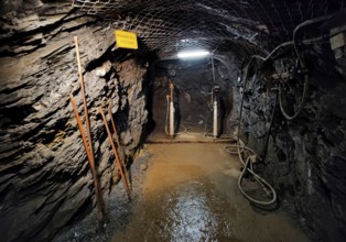 Mechanical drilling with a hammer drill in the Rammelsberg visitor mine, UNESCO World Heritage