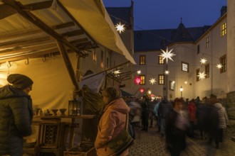 Christmas market with stalls in the castle courtyard of Schwarzenberg Castle, Erzgebirge, Saxony,