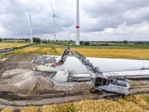 Demolished tower of a 20 year old wind turbine, in the Werl wind farm, 5 old Enercon E-66 turbines