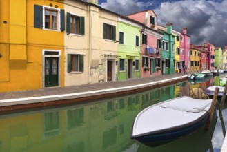 Colourful houses on the canal in Burano, Venice, Italy, Europe