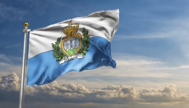 Flags, the national flag of San Marino flutters in the wind