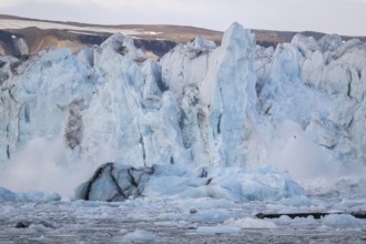 Calving glacier, calving, collapsing edge of Negribreen, Stjorfjord, Spitsbergen Island, Svalbard