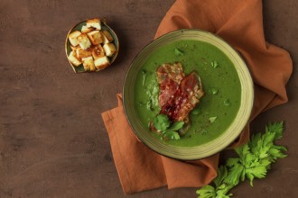 Green mashed soup, with bacon and croutons, homemade, no people