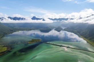 Fjord and mountains of the island Austvågøya, road on dam, Grunnførfjorden, Lofoten, Norway, Europe