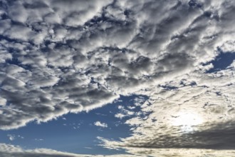 Cumulus clouds, cloudy sky, sun behind cloud cover, full-frame, Rosslare, Wexford, Ireland, Europe