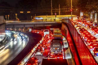 Evening traffic, partly with congestion, slow-moving traffic on the A40 motorway, traffic jam