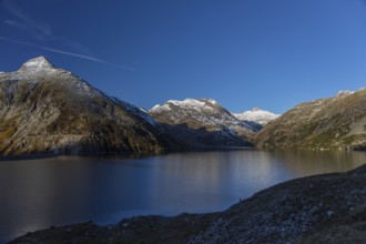 Kölnbrein reservoir and the Oberlecherspitzen mountain on a bright sunny morning. Seen from the