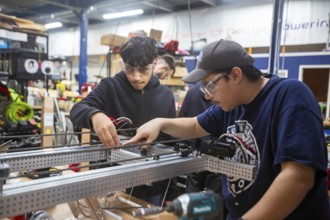 Detroit, Michigan - High school students build robots at the Detroit Hispanic Development Center's