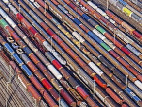 Deutsche Bahn AG marshalling yard. Many goods trains are parked on the tracks with tank wagons, car