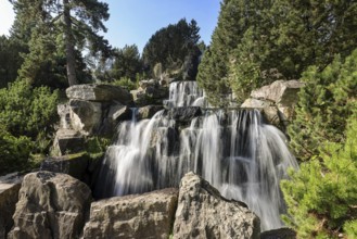 Essen, North Rhine-Westphalia, Germany - Alpinum with waterfall, Grugapark, a park in Essen,