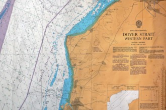 Close-up of nautical map with compass rose of the Dover Strait marking the boundary between the