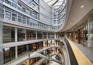 Stilwerk Düsseldorf, interior photo, elliptical atrium with surrounding galleries on five sales