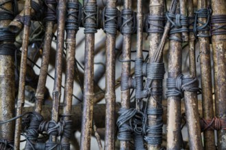 Close-up of a complex bamboo installation with ropes, bamboo sculpture by Doug and Mike Starn, art