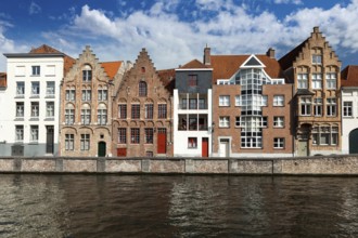 Canal and medieval houses. Bruges (Brugge), Belgium, Europe