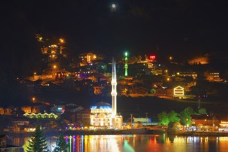 Uzungol mosque reflecting in the lake at night, Trabzon, Turkey, Asia