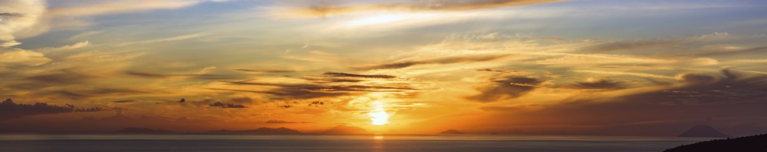 Panorama of Sunset over Aeolian Islands and Stromboli Volcano from Nicotera, Aeolus, Sicily,
