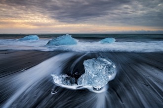 Diamond Beach, icebergs on the black lava beach, near Jökulsarlon glacier lagoon, Vatnajökull