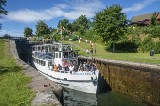 The excursion ship Kung Sverker in a lock on Göta Canal at Borenshult. Göta Canal was built between