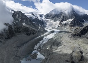 Aerial view, mountain landscape with glacier tongue Glacier de Cheilon and summit Mont Blanc de